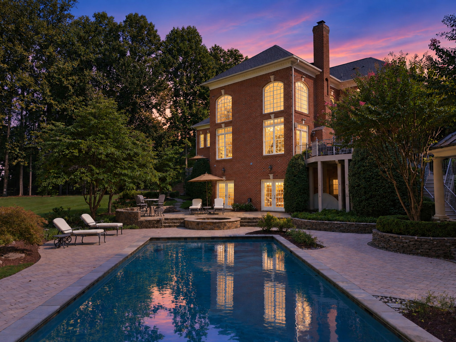 3002 Apple Brook Ln, Oakton VA — Rear elevation and pool at twilight
